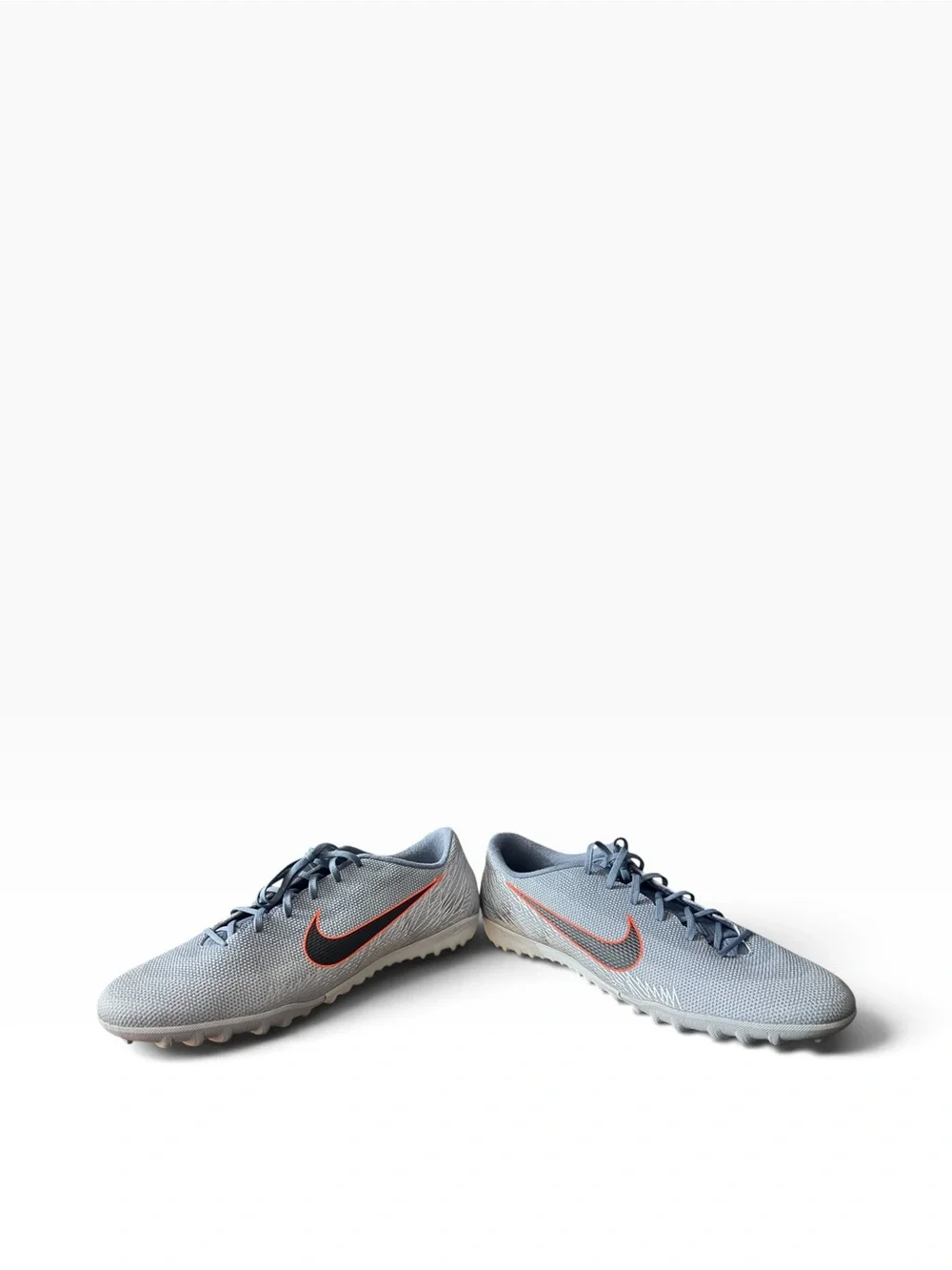 Nike Men’s Gray Athletic Shoes with Orange Accent Swoosh